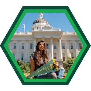 Student in front of Sacramento capitol building.